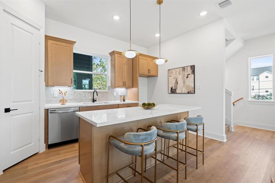 This well appointed kitchen is loaded with modern finishes.