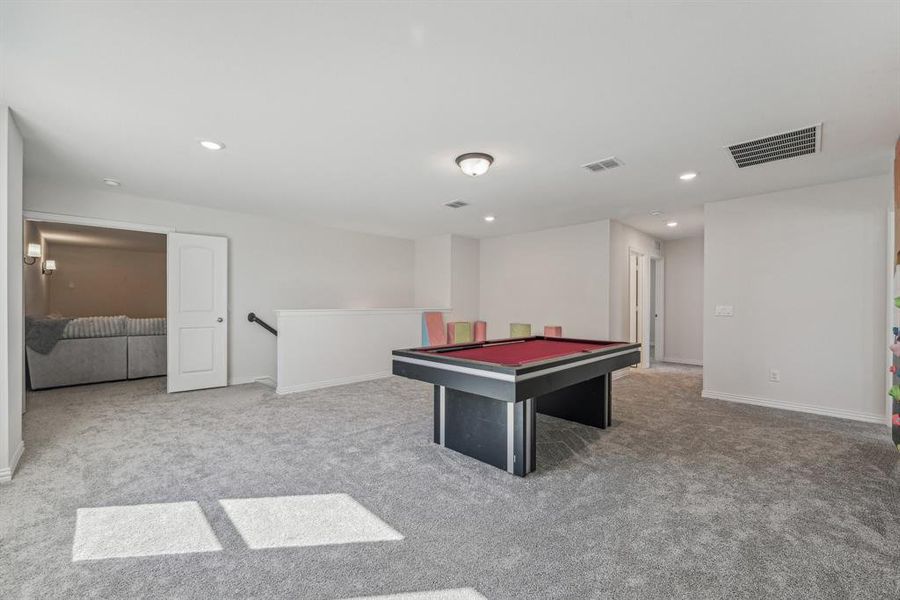 Playroom with billiards and carpet