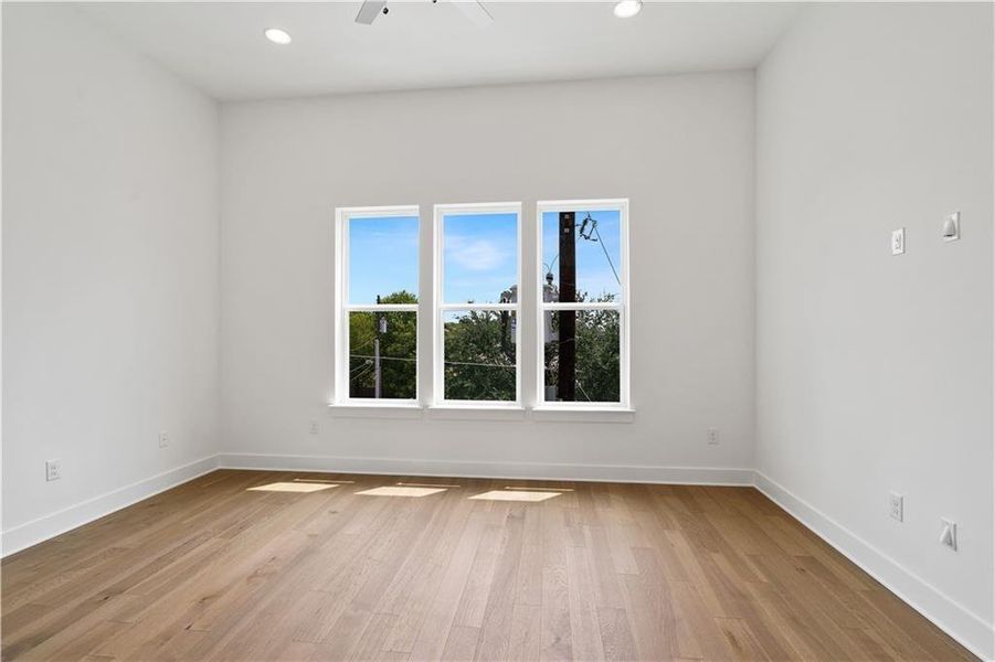 Example of Primary bedroom with lots of natural light