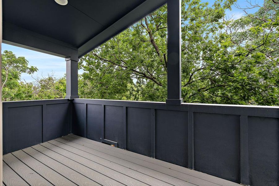 Left side of private treetop balcony accessed only by the primary suite.