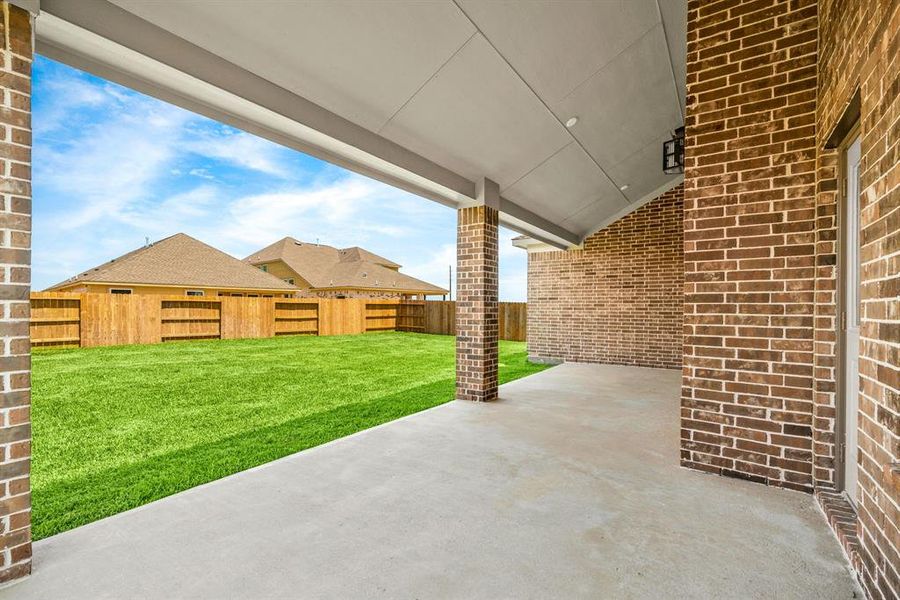 Large covered patio - Experience outdoor living at its finest on this expansive covered patio, thoughtfully designed for BBQs and delightful al fresco dining