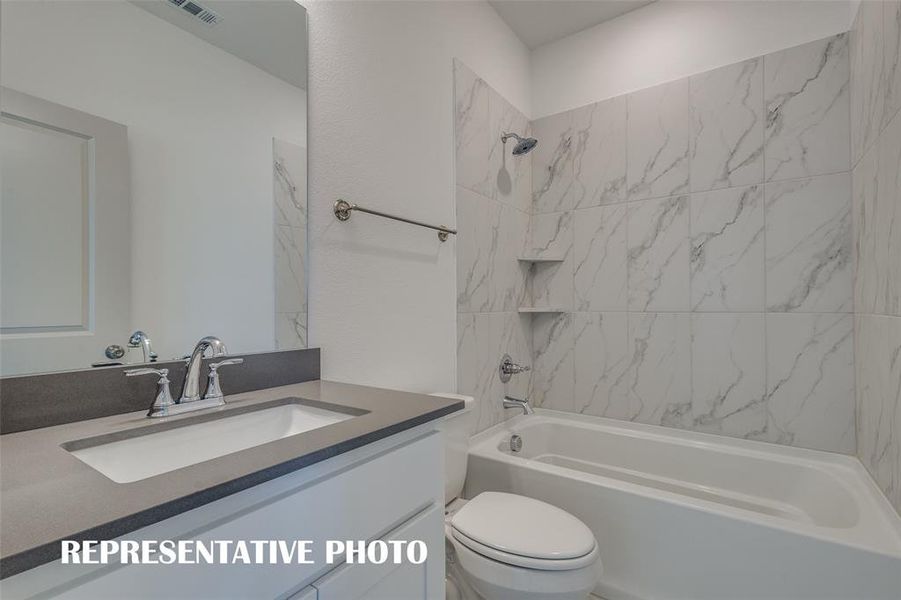 Guests will feel right at home in this beautifully finished guest bath.  REPRESENTATIVE PHOTO