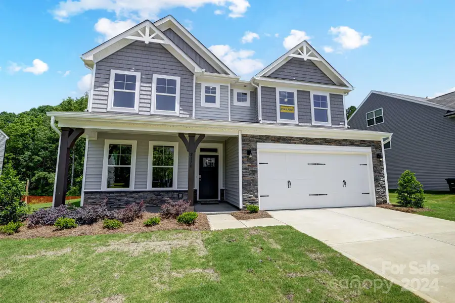 MOVE-IN READY! Homesite 1 features a Davidson floorplan with front-load garage.