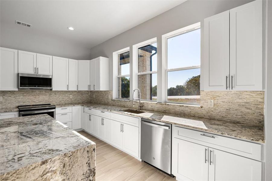 Extensive Granite Counters Provide Fabulous Prep Space