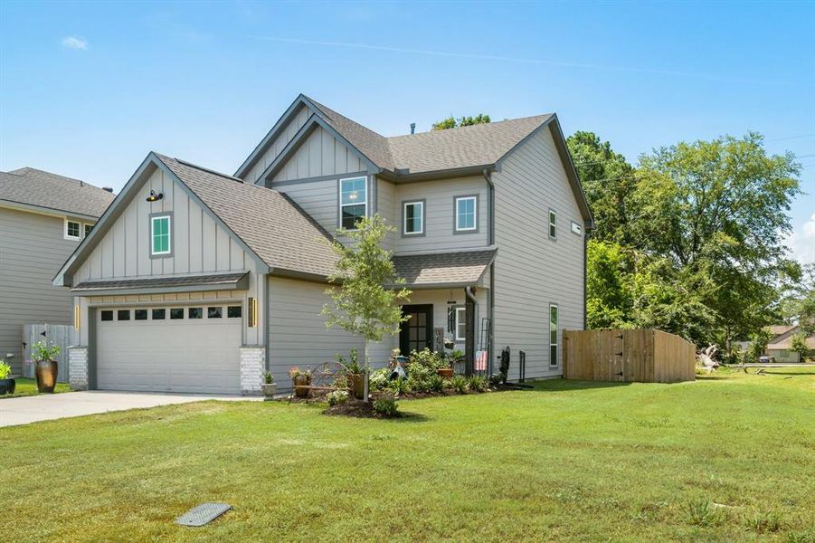 Gutters were added to front and back of entire home, along with garage floor epoxy and added shelving!  Attic access was added in garage along with decking for extra storage!