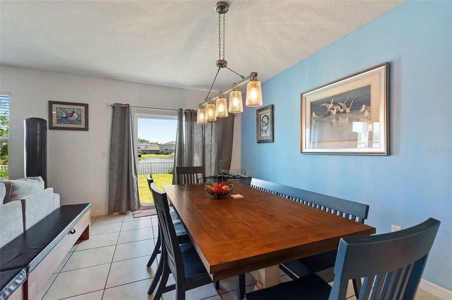 Dining Area with sliding glass doors to the back yard.