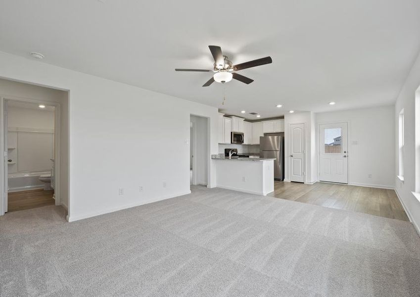 Open layout with the cozy living room connected to the kitchen.