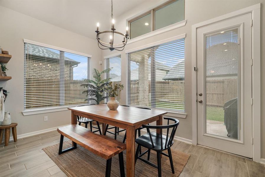 Dining area leads to back door.