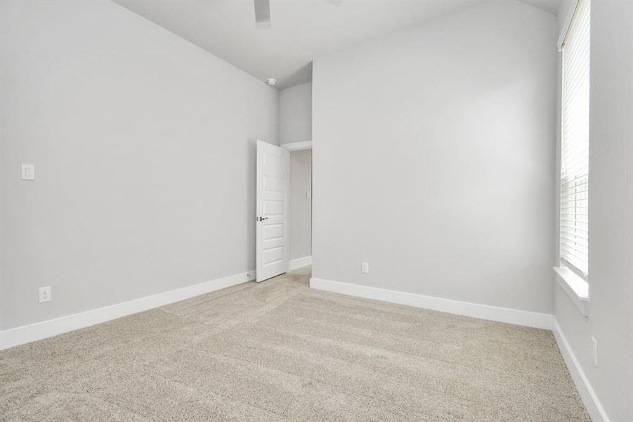 Generously sized secondary bedrooms, complete with spacious closets and soft, inviting carpeting. Enjoy abundant natural light streaming in through the large windows, complemented by privacy blinds for your personal sanctuary.