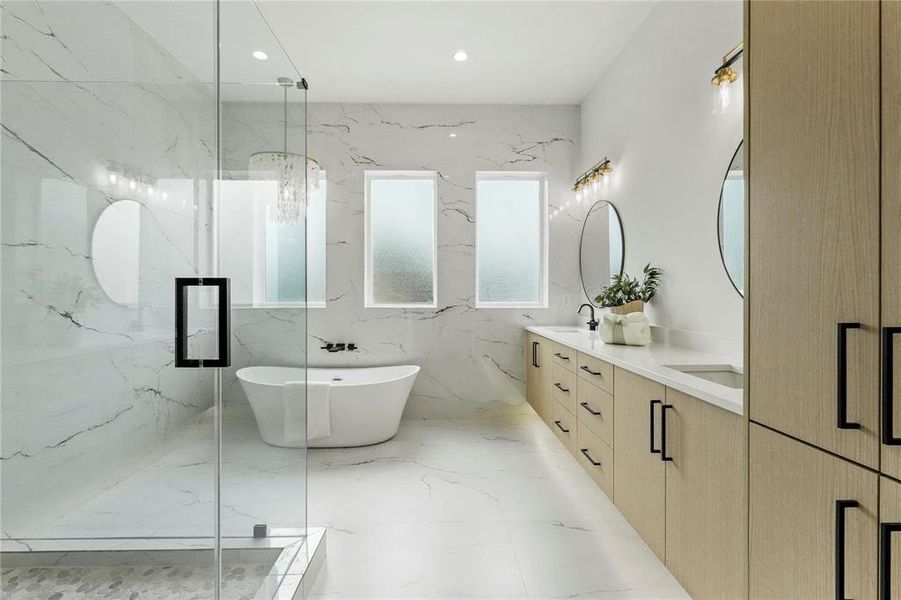 Bathroom with vanity, independent shower and bath, and tile walls