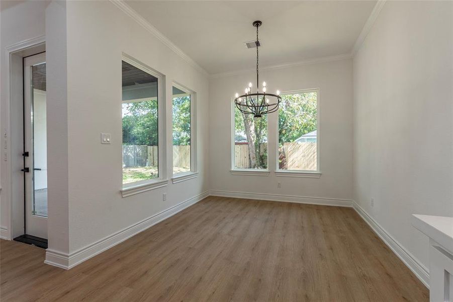 There's no shortage of natural lighting in the lovely breakfast nook.