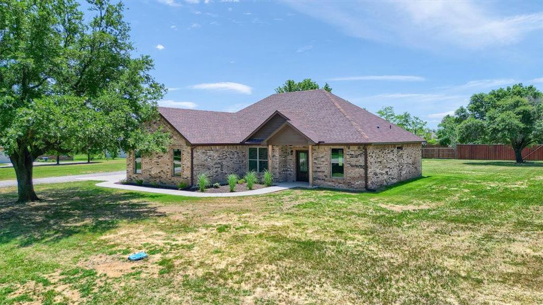 View of front of home with a front yard