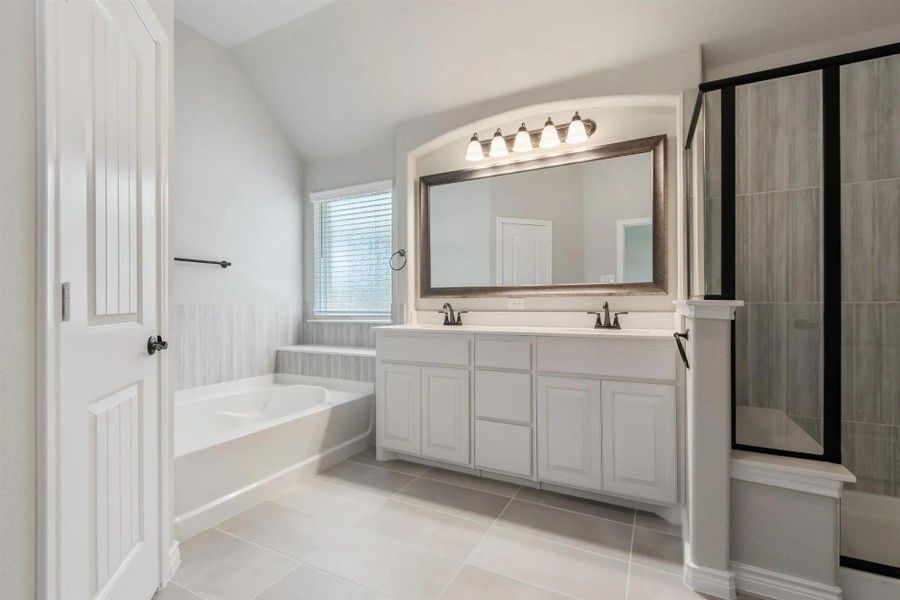 Primary Bathroom | Concept 2393 at Lovers Landing in Forney, TX by Landsea Homes