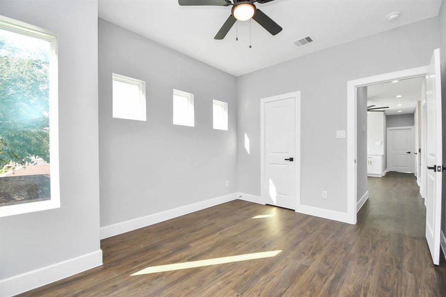 Secondary bedroom with walk in closet