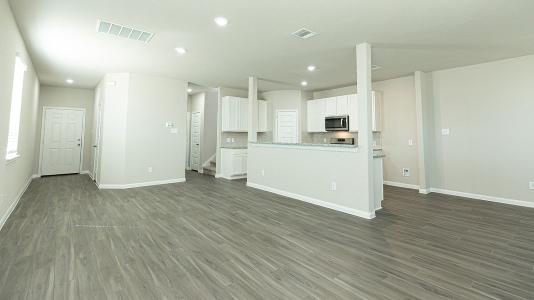 Family Room to Kitchen and Dining Area