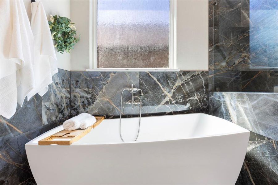 This large soaking tub is a DREAM! Enjoy your spa-like experience!