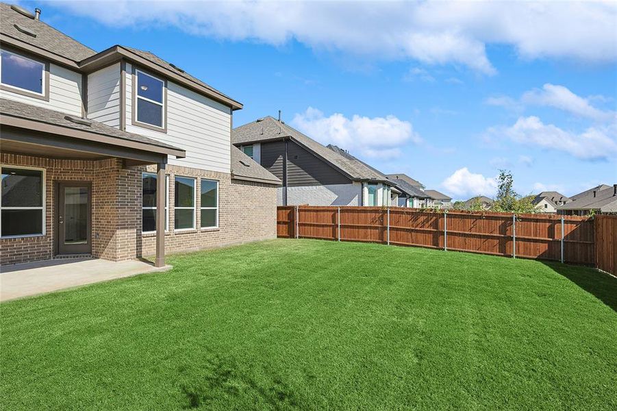 View of yard with a patio