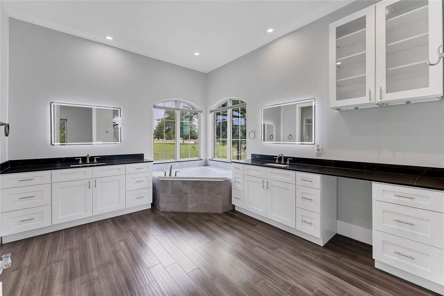 Primary Suite with dual vanity and soaking tub