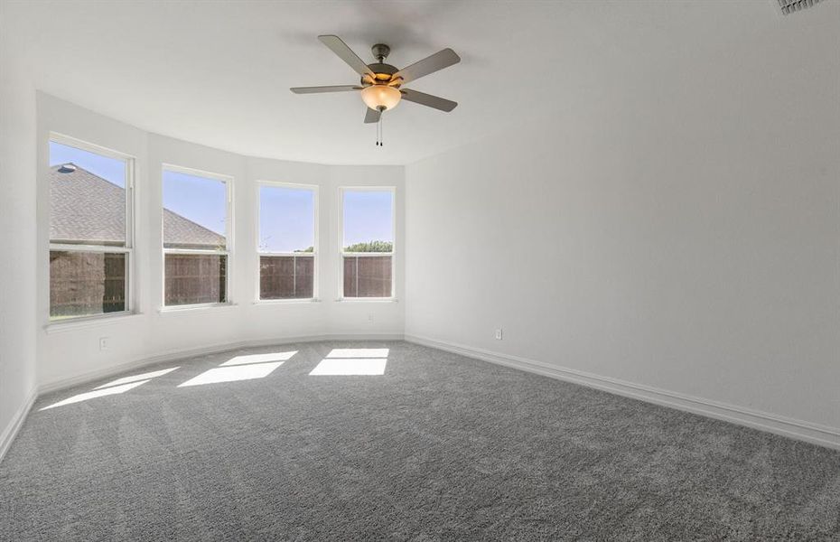 Elegant owner's suite with Bay window *real home pictured