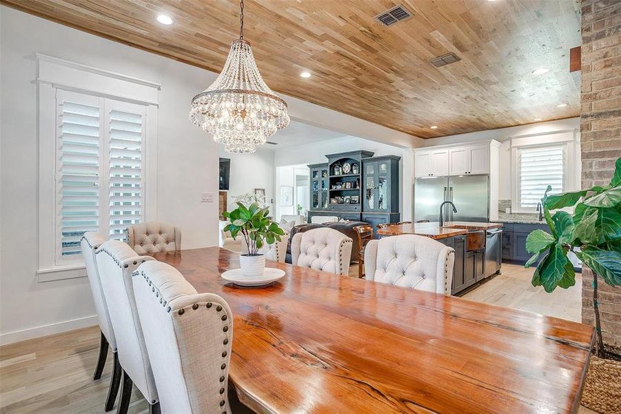 Large dining room overlooking the backyard.