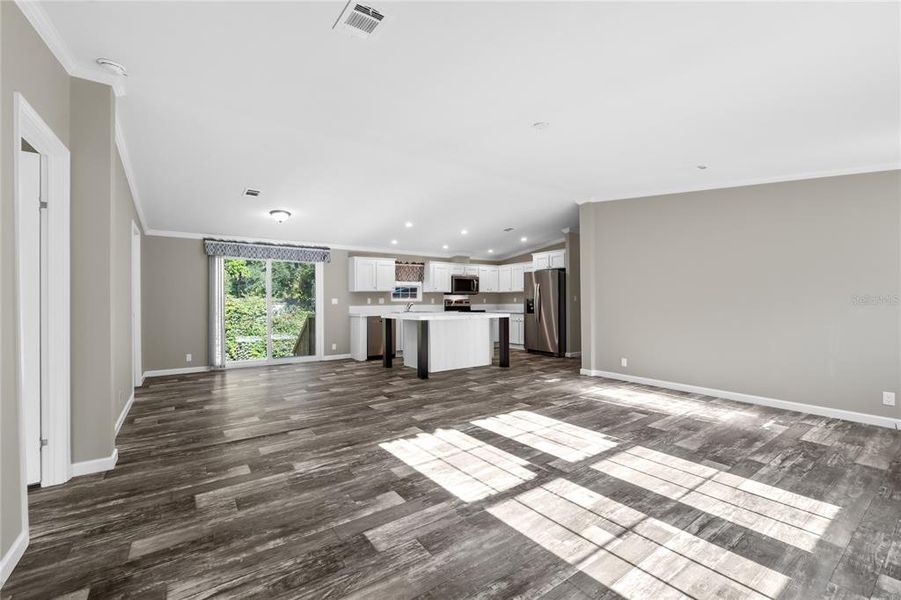 Living Room w/ view of Dinette & Sliding Glass Door Rear Entry