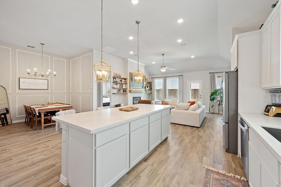 Oversized kitchen island with quartz counter tops