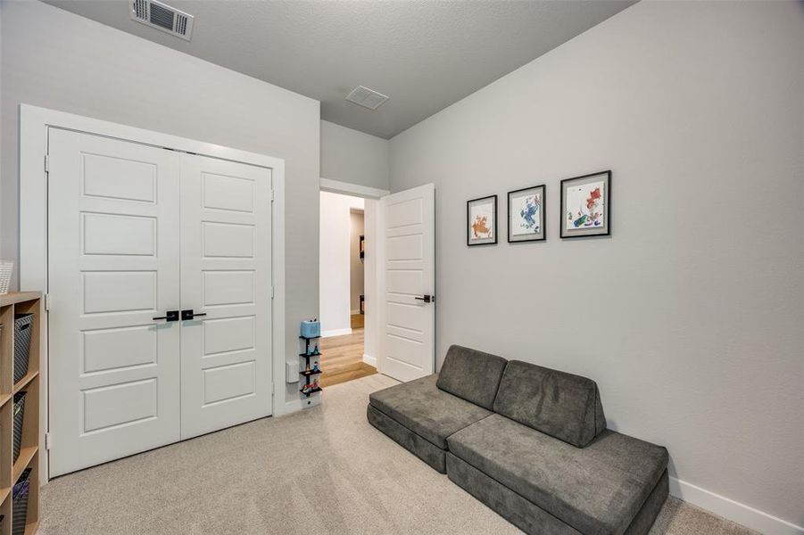 Bedroom with carpet flooring