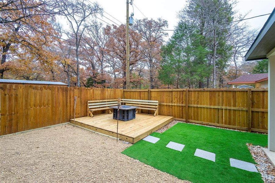 View of yard featuring a wooden deck