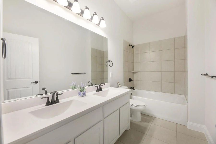 Bathroom | Concept 2404 at Massey Meadows in Midlothian, TX by Landsea Homes