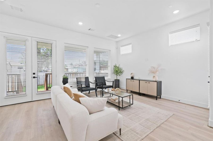 French doors lead to expansive covered patio.