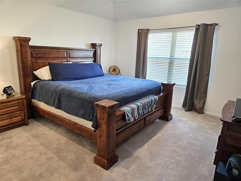Primary bedroom fits a kings size bed, night stands and dresser.