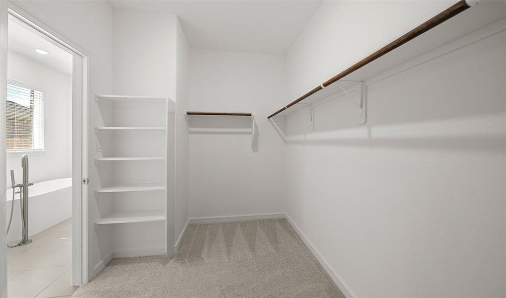 Huge primary walk-in closet