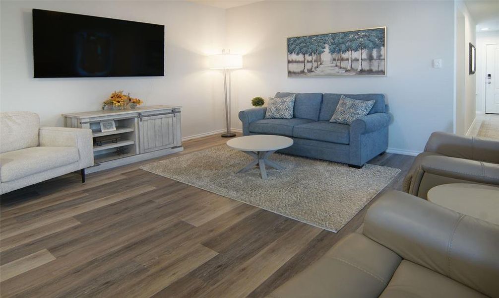 Living room with wood-type flooring