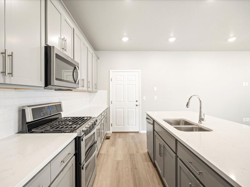 The Vail floorplan interior image taken at a Meritage Homes community in Northern Colorado.