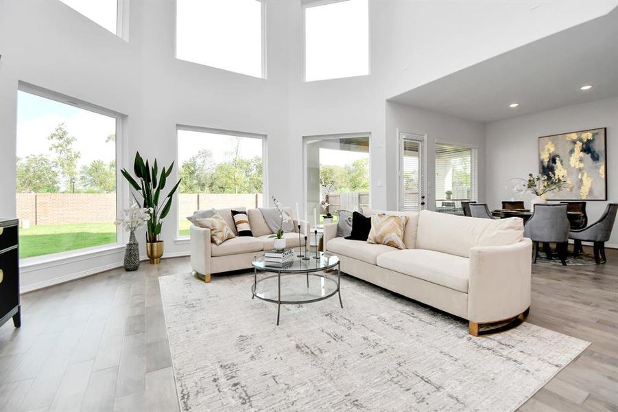 Enjoy your luxury home with soaring,tray ceilings that add a touch ofdepth. You'll be showered withambient lighting from 6, stunninglarge windows that make astatement.