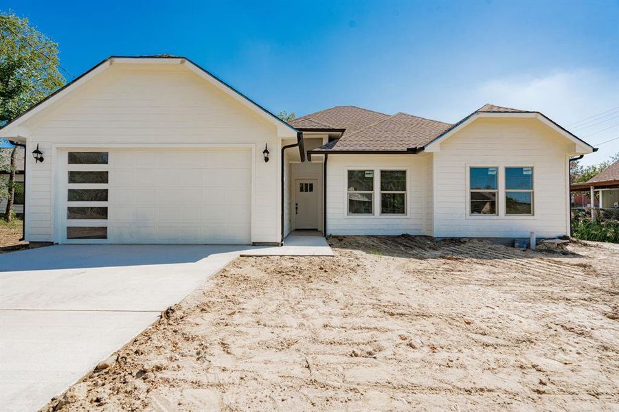 Single story home with a garage