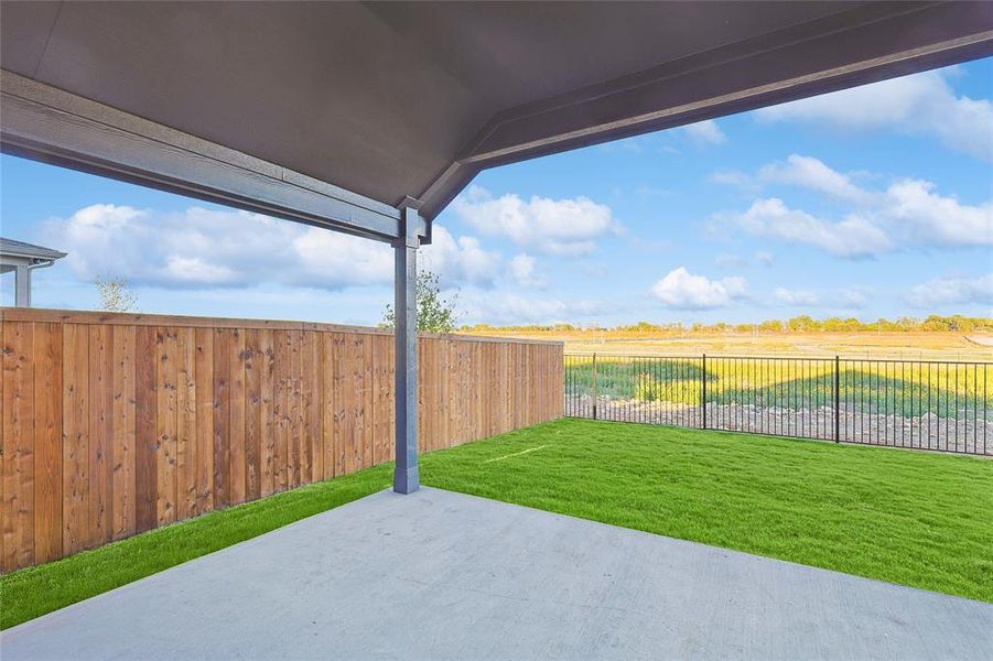 View of yard featuring a patio area and a rural view