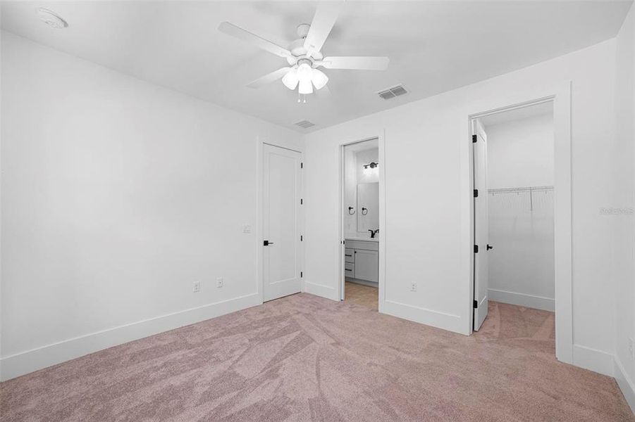 Bedroom #4 with walk in closet and en suite bathroom