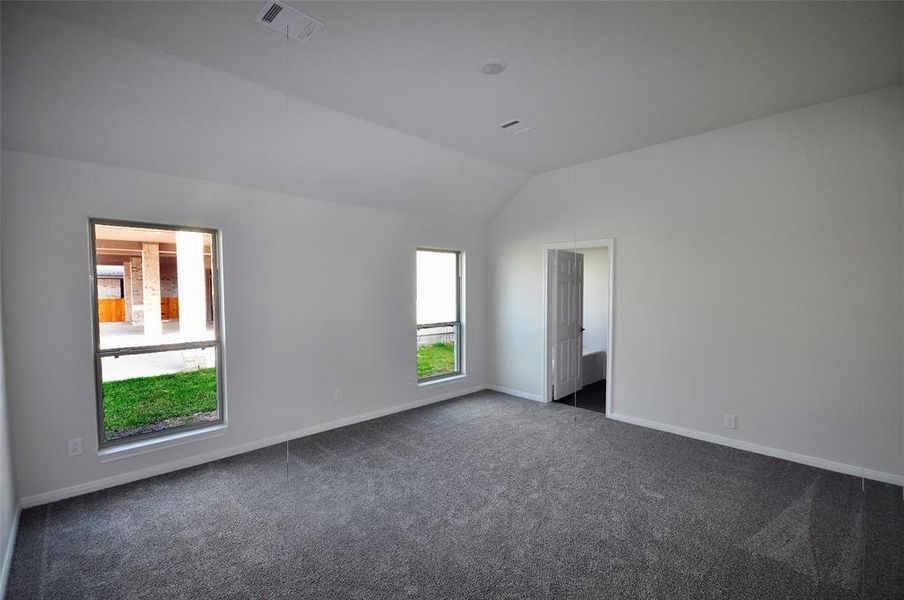 Master Bedroom ceiling slopes to 10 ft.