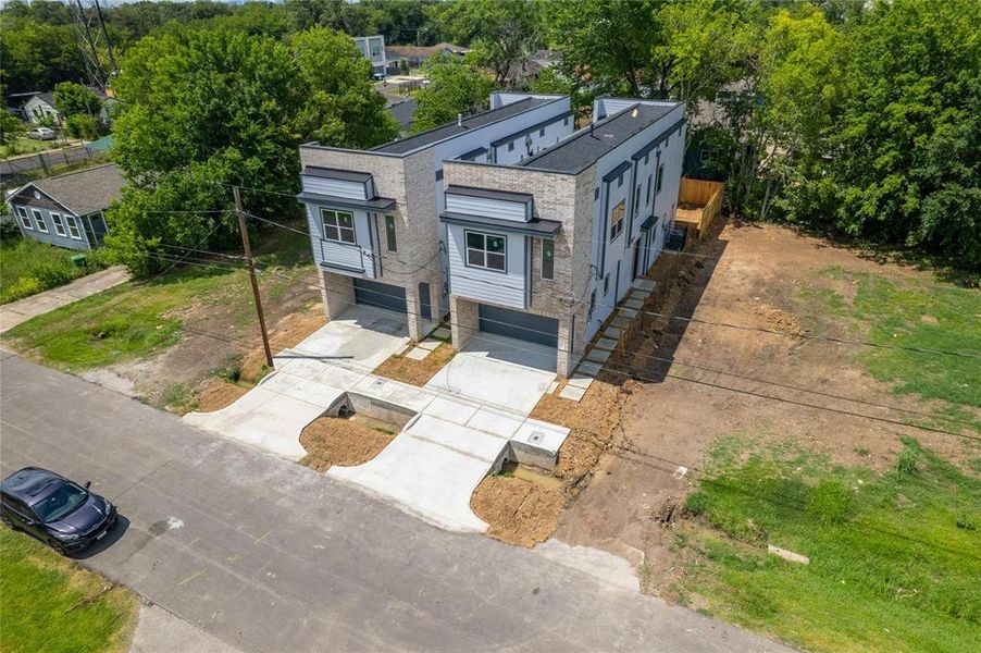 The developer plans to build several more similar homes on the adjacent land.