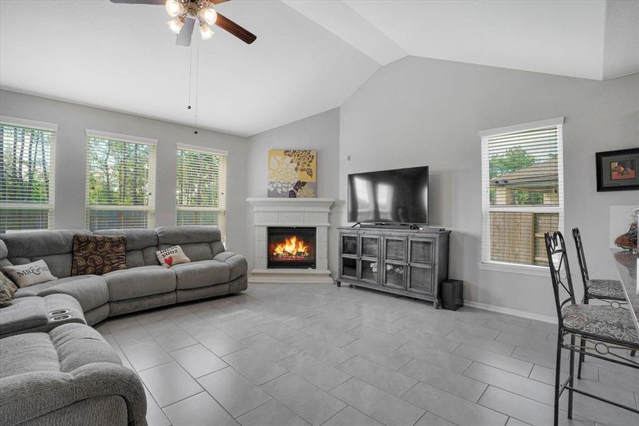 Seamless flow between the welcoming family room and modern kitchen.