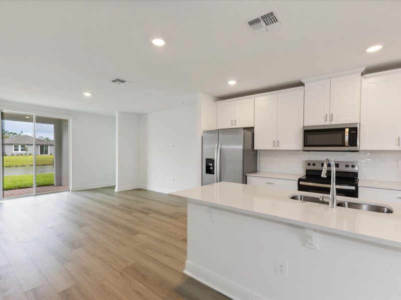 Kitchen in the Everglade floorplan at 209 Links Terrace Blvd