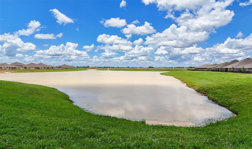 Take a stroll around the community pond.