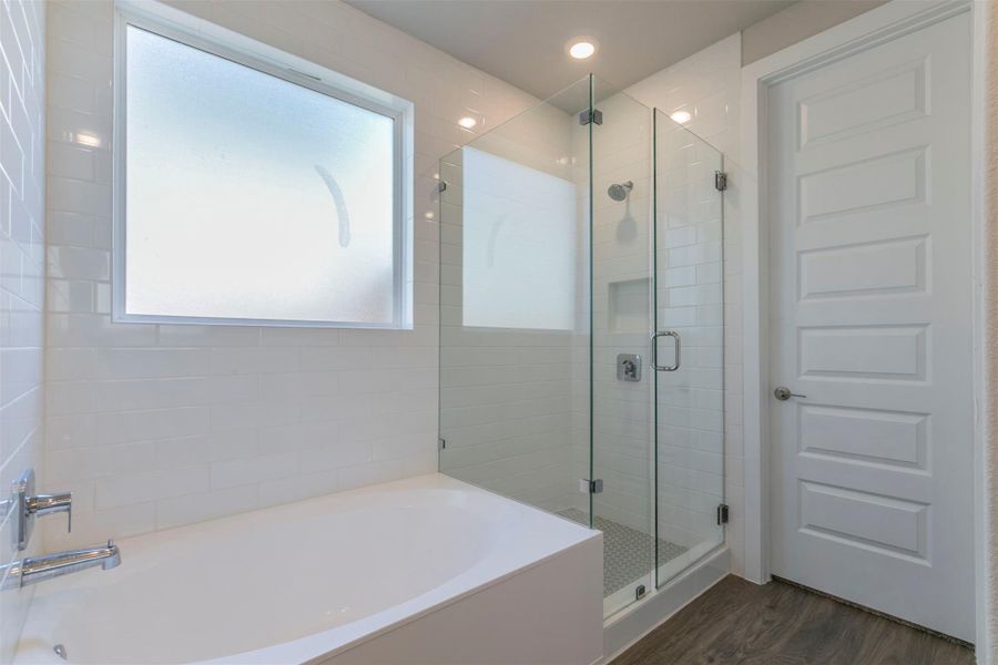 Primary bath with separate tub and shower