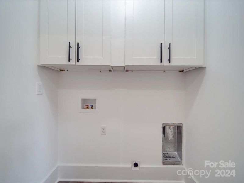 Laundry with cabinet storage