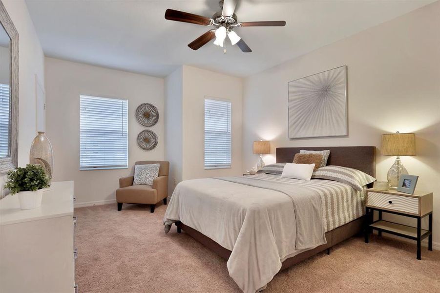 Find your tranquility in the primary bedroom, large enough for your king-sized bed, night stands, and additional furniture in the room.