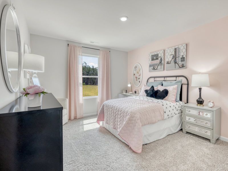 Secondary bedroom in the Sherwood floorplan at a Meritage Homes community in Garner, NC.