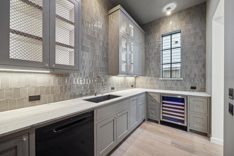 Additional view of the pantry. This space is ideal for any entertaining!