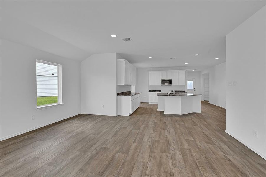 Down the amazing Hallway with stunning Rev Wood Floors laid in an Upgraded Patter pass the Gourmet Kitchen you will discover the Guest Bedrooms and more! **Image Representative of Plan Only and May Vary as Built**