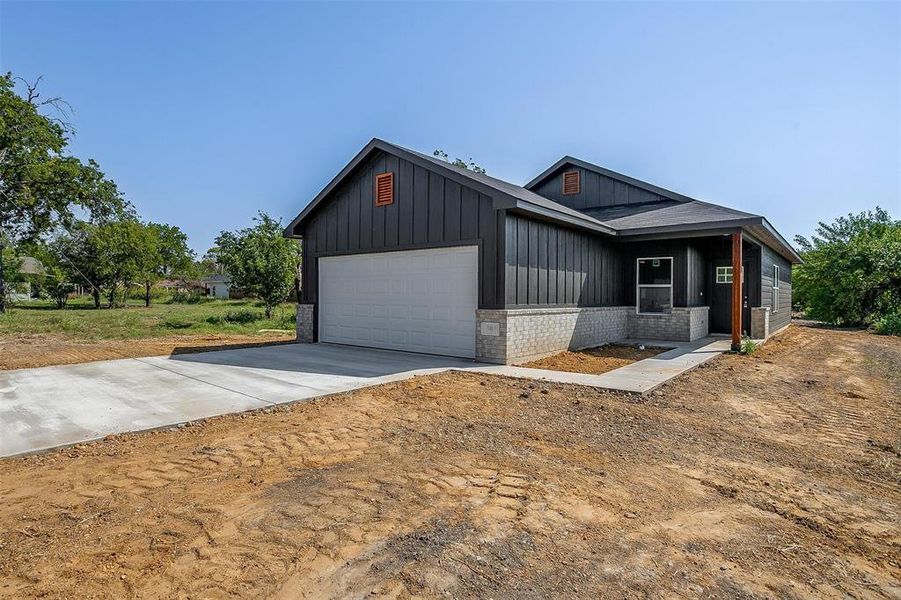 View of front of home with a garage